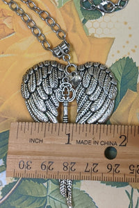 Beautifully detailed Angel Wing pendant measures 2-1/2" x 1-3/4".