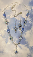 Load image into Gallery viewer, Beautiful handmade blue beaded necklace. Lamp work and cat&#39;s eye beads. 20&quot; silver plated chain with 4&quot; extender chain.
